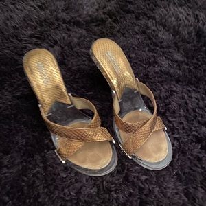 Michael Kors Gold/ Clear Slip-on Heel size 8 1/2 M. Fits more like an 8.